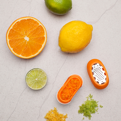 Microplane Flexi citrusrivejern med opsamler orange
