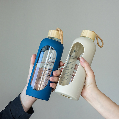 Motivations drikkeflaske glas/silikone 750 ml - assorterede farver