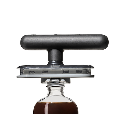 OXO Good Grips lågåbner med underlag